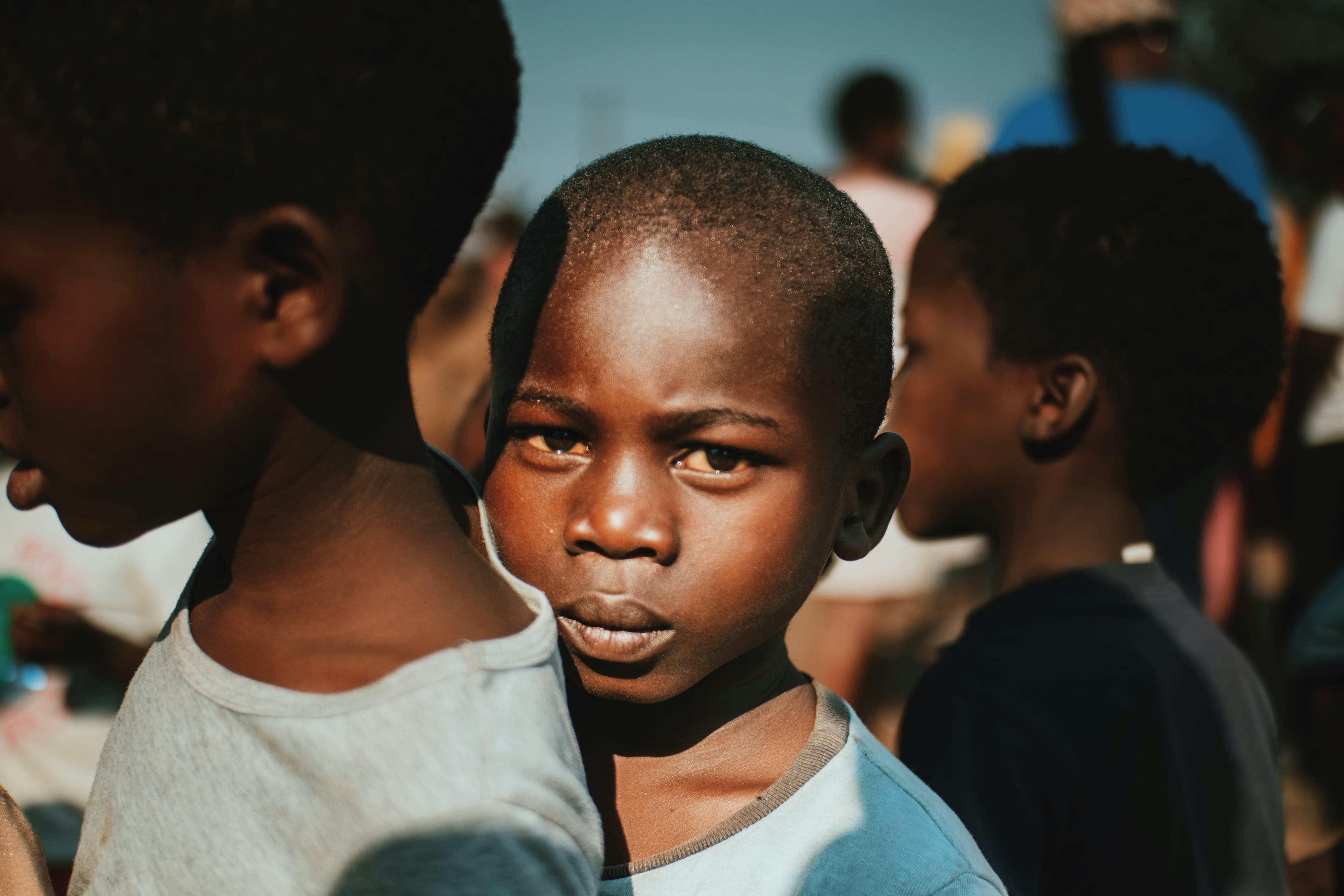 Children receiving qurbani meat